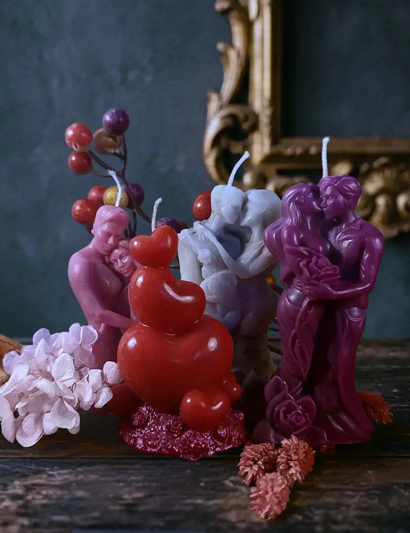handmade candles shaped as couples used in love spell ritual setup